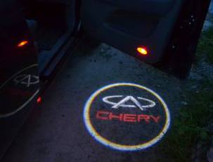 Проекция логотипа Chery