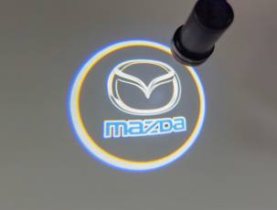 Проекция логотипа Mazda